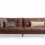 Tufted brown leather sofa